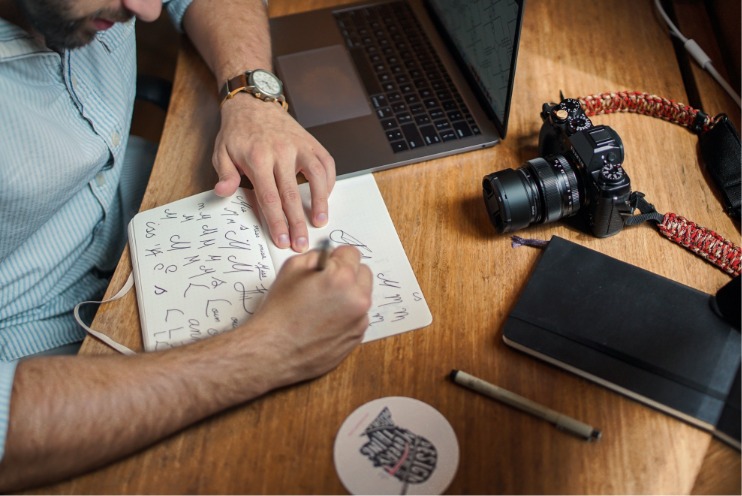 Designer making brand sketches